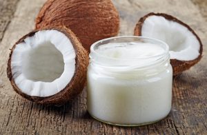two-coconuts-and-coconut-oil-in-jar-without-lid